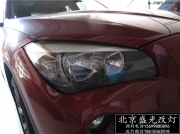 北京寶馬X1改燈 寶馬X1低配升級原廠高配天使眼氙燈總成