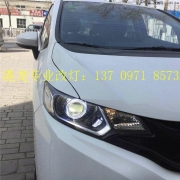 西寧本田飛度改透鏡，西寧港龍專業(yè)車燈升級改裝。