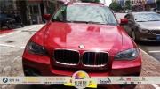 南寧車身改色貼膜,寶馬X6車身改色,卡萊斯閃鉆珠光紅色